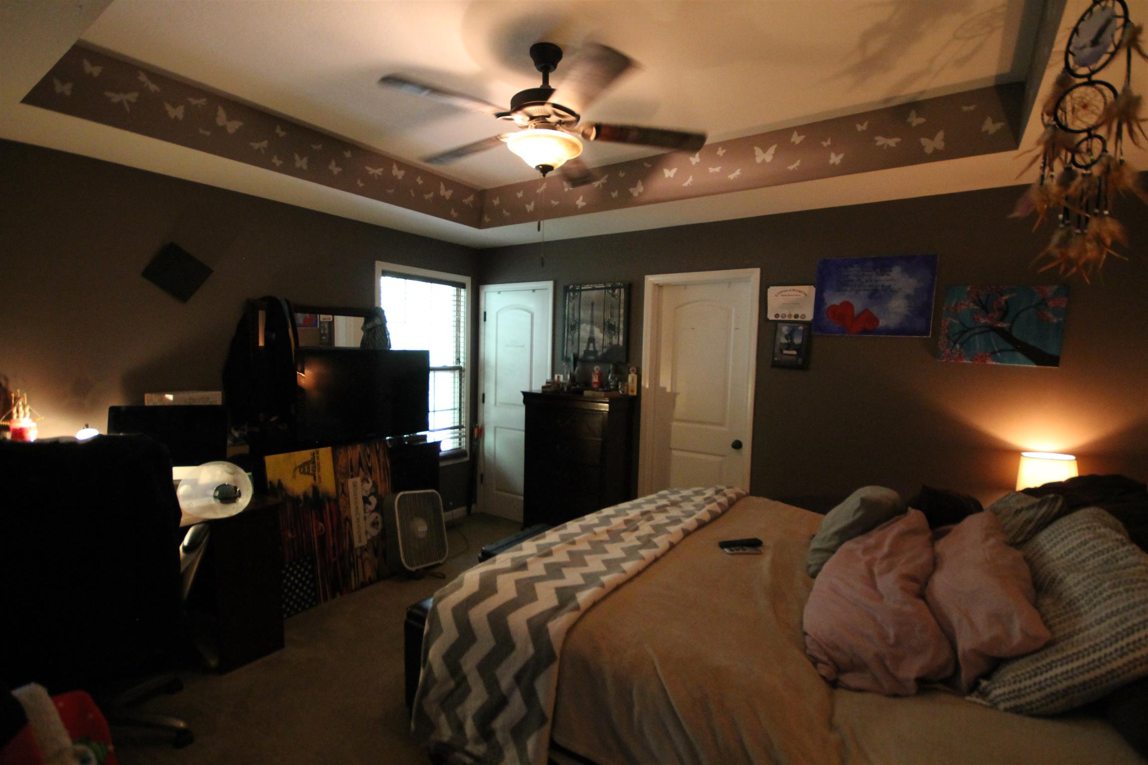 2195 River Road Clarksville, TN 37040 - Photo 14 of 18 a bedroom with a bed window and a chandelier