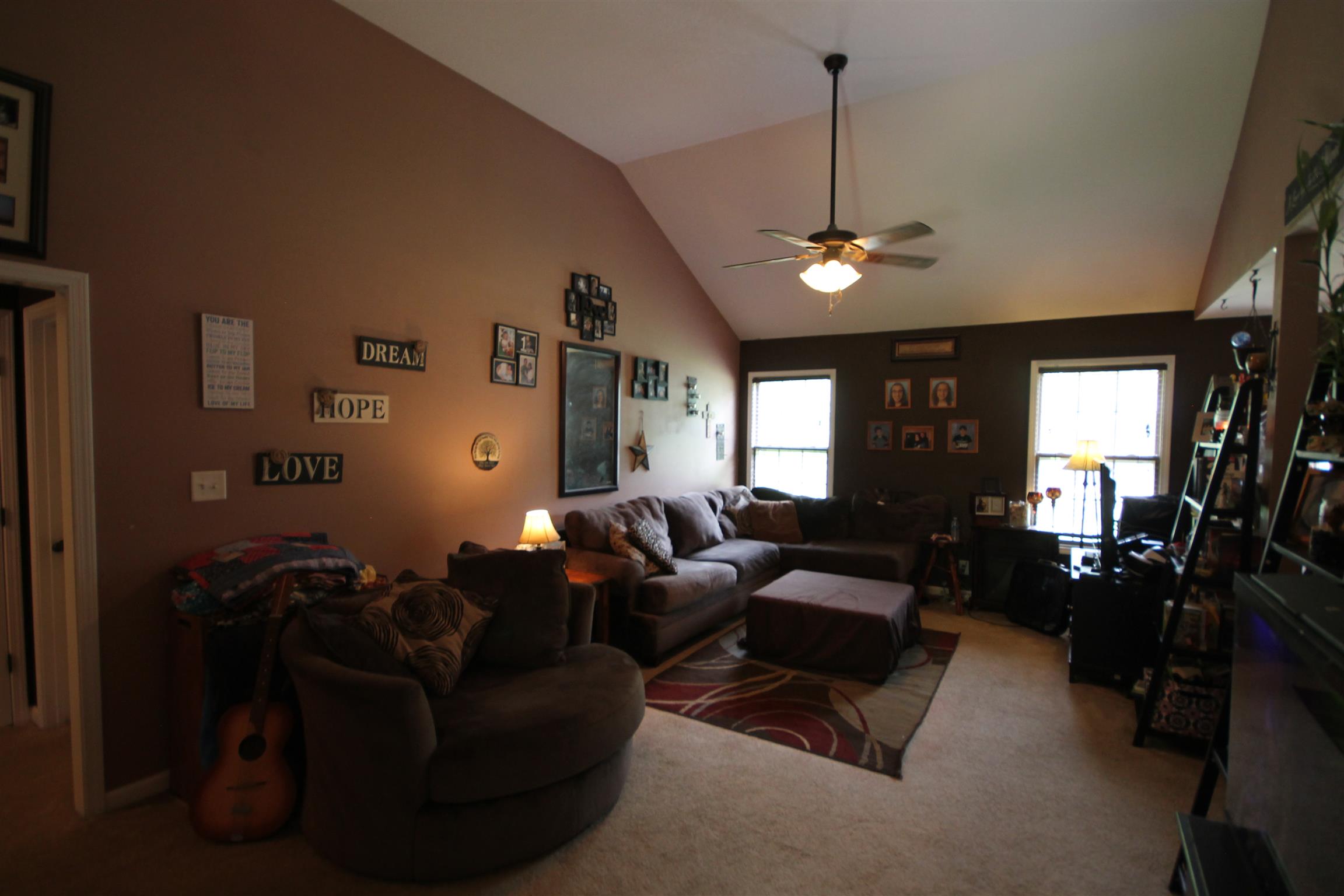 2195 River Road Clarksville, TN 37040 - Photo 8 of 18 a living room with furniture a chandelier and a window