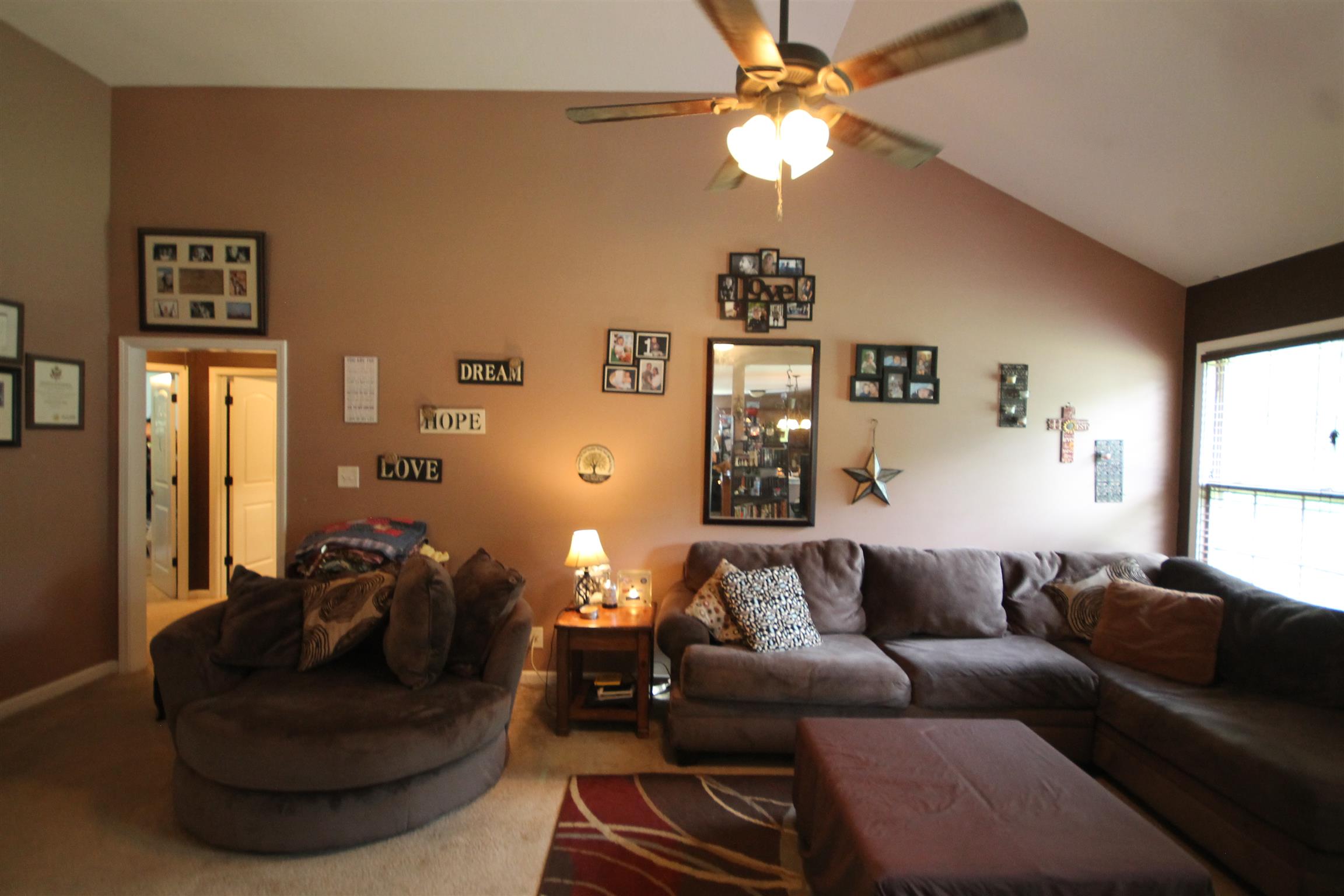 2195 River Road Clarksville, TN 37040 - Photo 9 of 18 a living room with furniture and a lamp
