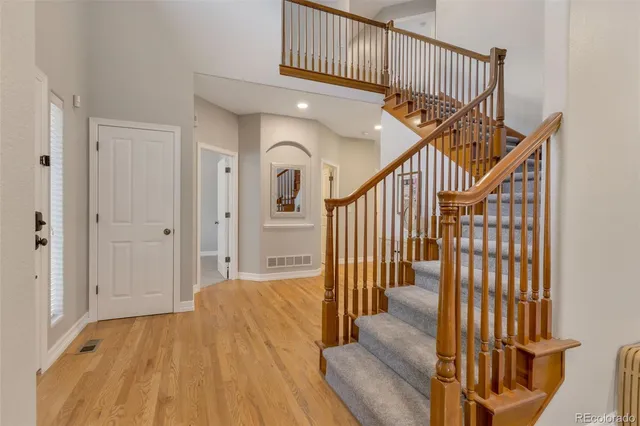 a view of entryway with wooden floor