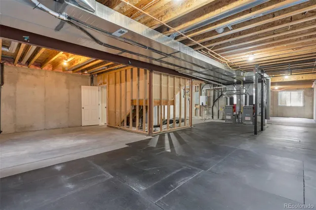 a view of a porch with chairs and backyard