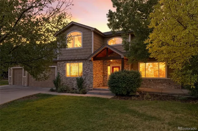 a view of an house with backyard porch and sitting area
