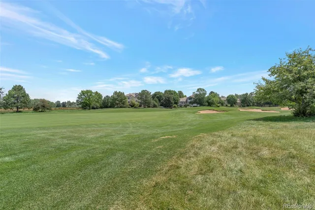 a view of a car park in front of house