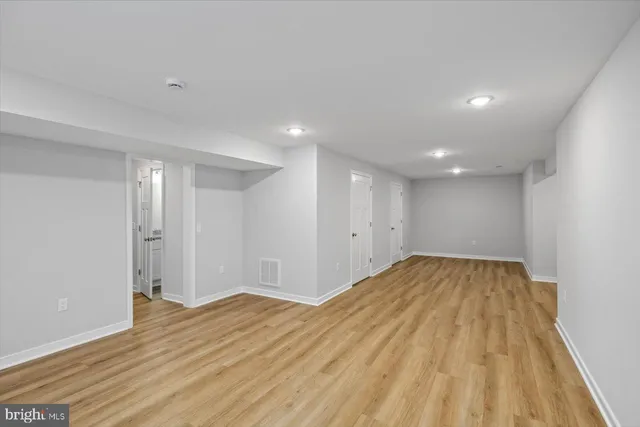 a view of a room with racks on the wall