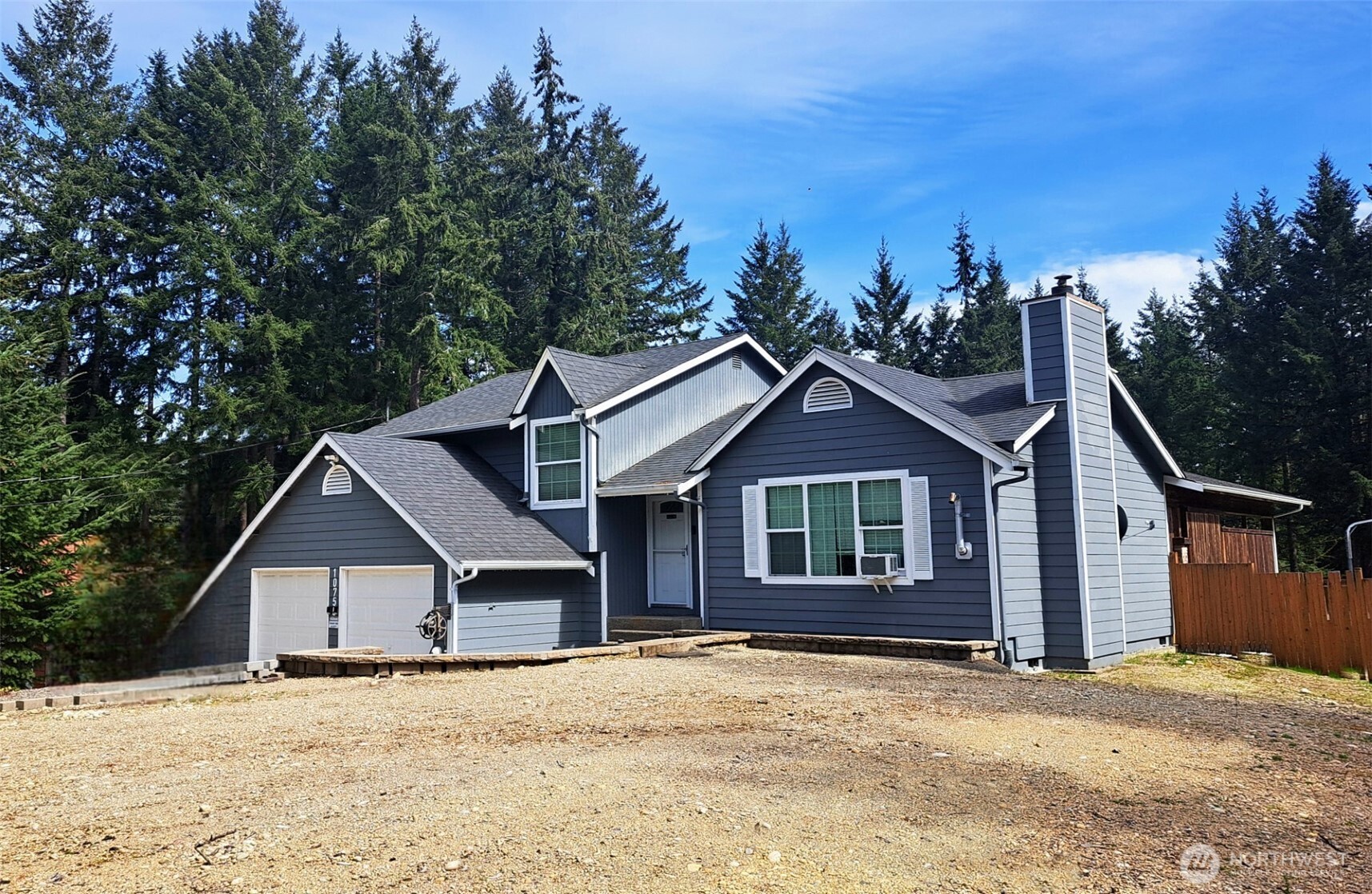 10755 Ridge Rim Trail Southeast Port Orchard, WA 98367 - Photo 2 of 2 a front view of a house with a yard