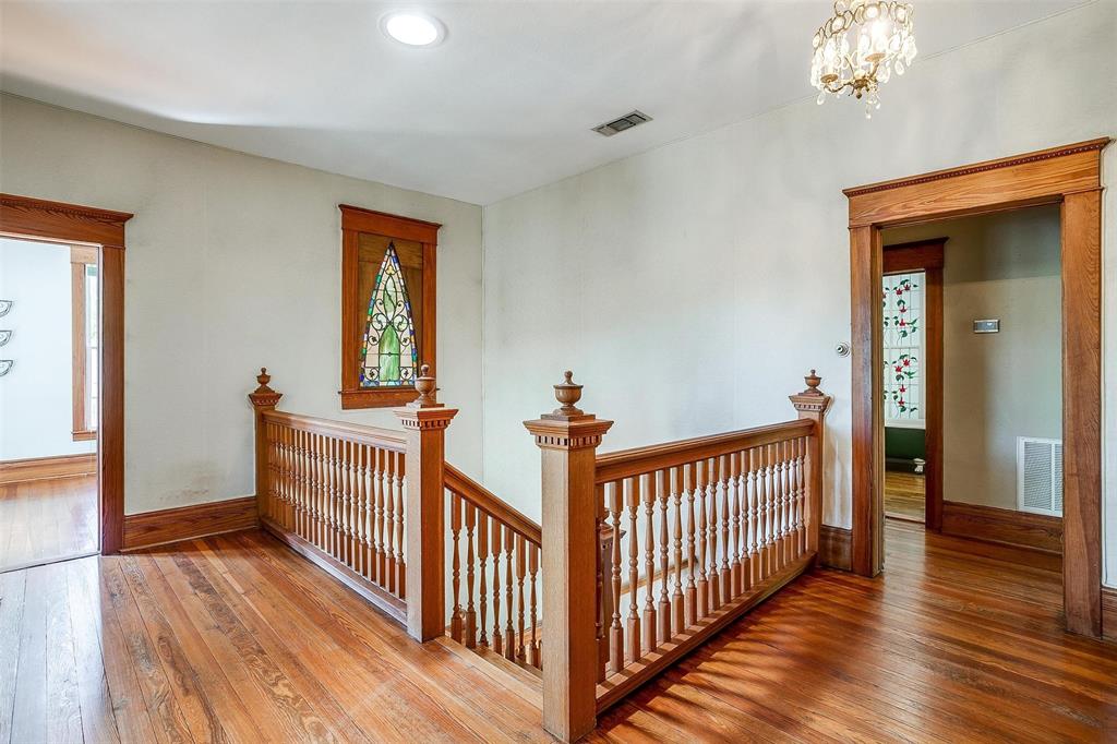 708 South Waco Street Weatherford, TX 76086 - Photo 17 of 35 a view of a room with wooden floor and windows