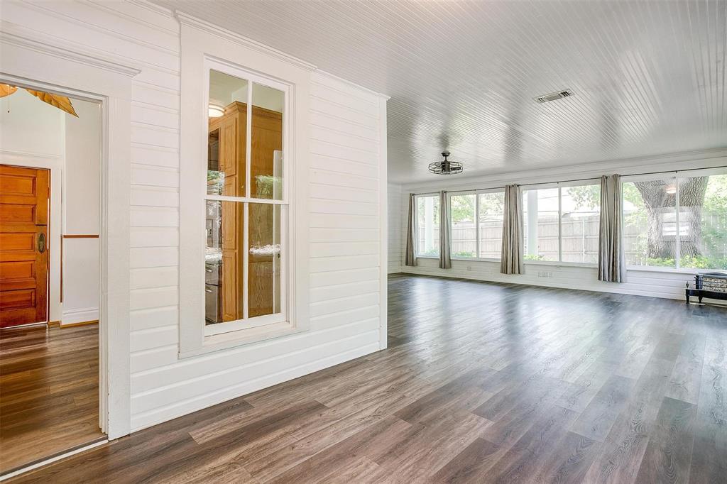 708 South Waco Street Weatherford, TX 76086 - Photo 20 of 35 wooden floor in an empty room with a window