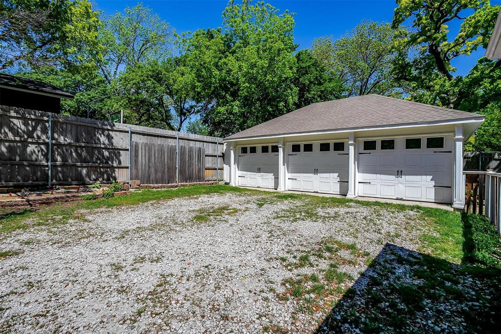 708 South Waco Street Weatherford, TX 76086 - Photo 32 of 35 a view of a house with a yard and large tree