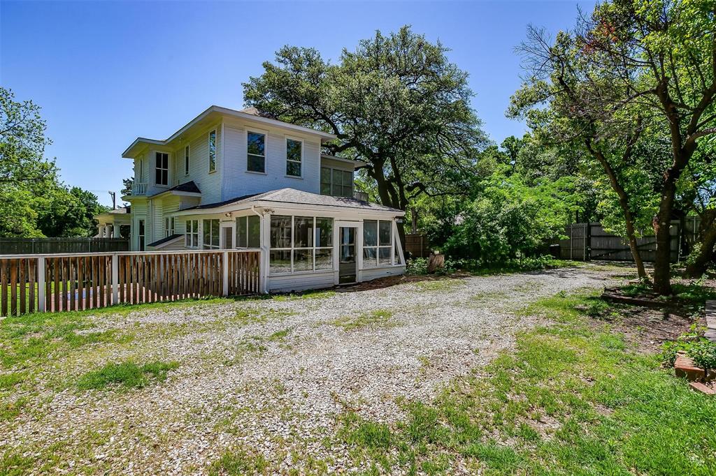 708 South Waco Street Weatherford, TX 76086 - Photo 33 of 35 a front view of a house with a yard