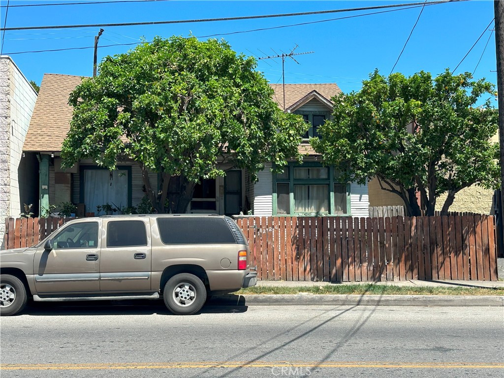 1226 Hooper Avenue Los Angeles, CA 90021 - Photo 3 of 5 a view of a car parked in front of a house