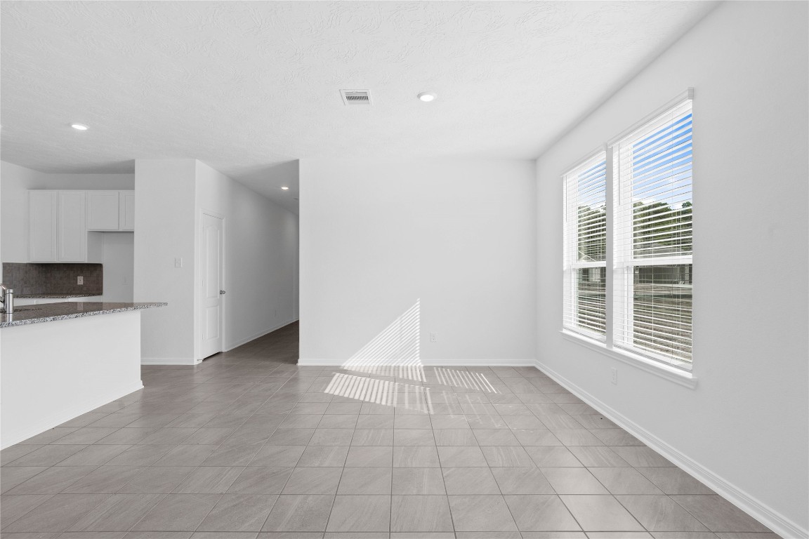833 Mustang Rdg Terrace Magnolia, TX 77354 - Photo 11 of 21 a view of an empty room with a window
