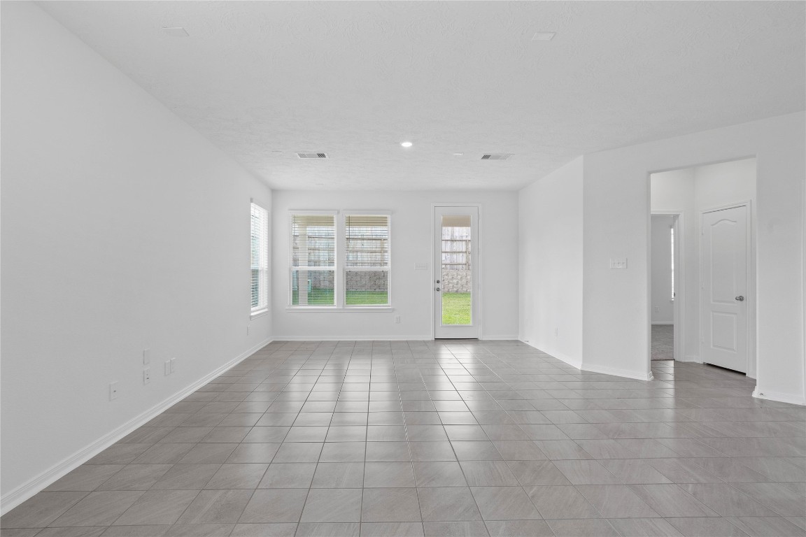 833 Mustang Rdg Terrace Magnolia, TX 77354 - Photo 12 of 21 an empty room with windows