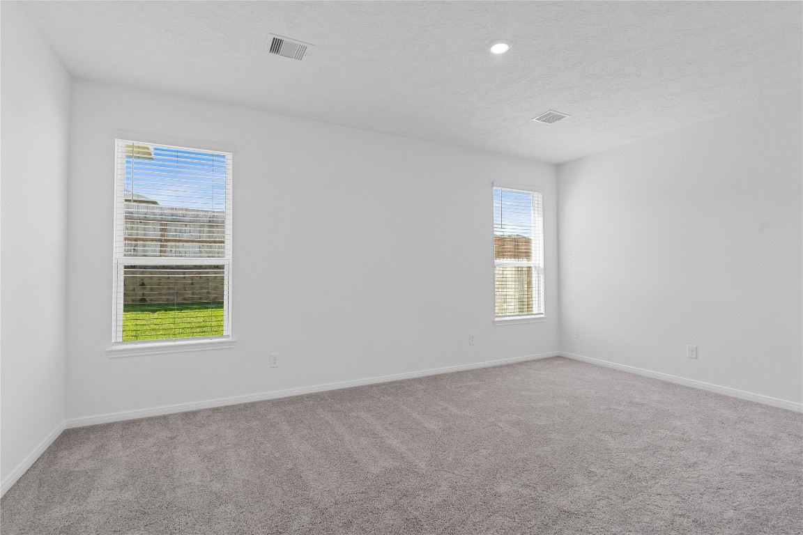 833 Mustang Rdg Terrace Magnolia, TX 77354 - Photo 14 of 21 an empty room with a window