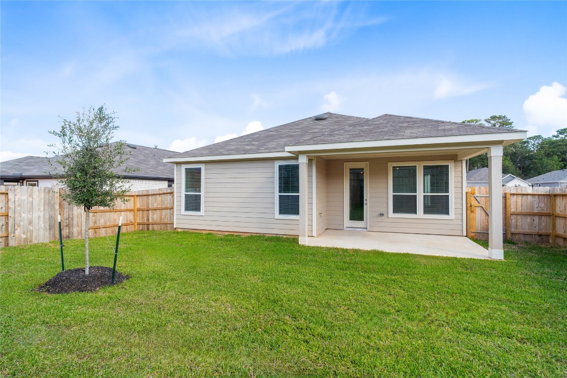 833 Mustang Rdg Terrace Magnolia, TX 77354 - Photo 17 of 21 a house view with a garden space