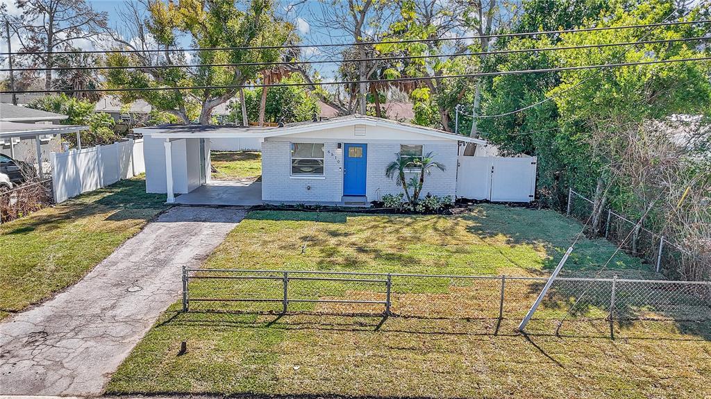 6510 West Chelsea Street Tampa, FL 33634 - Photo 3 of 20 a view of a backyard