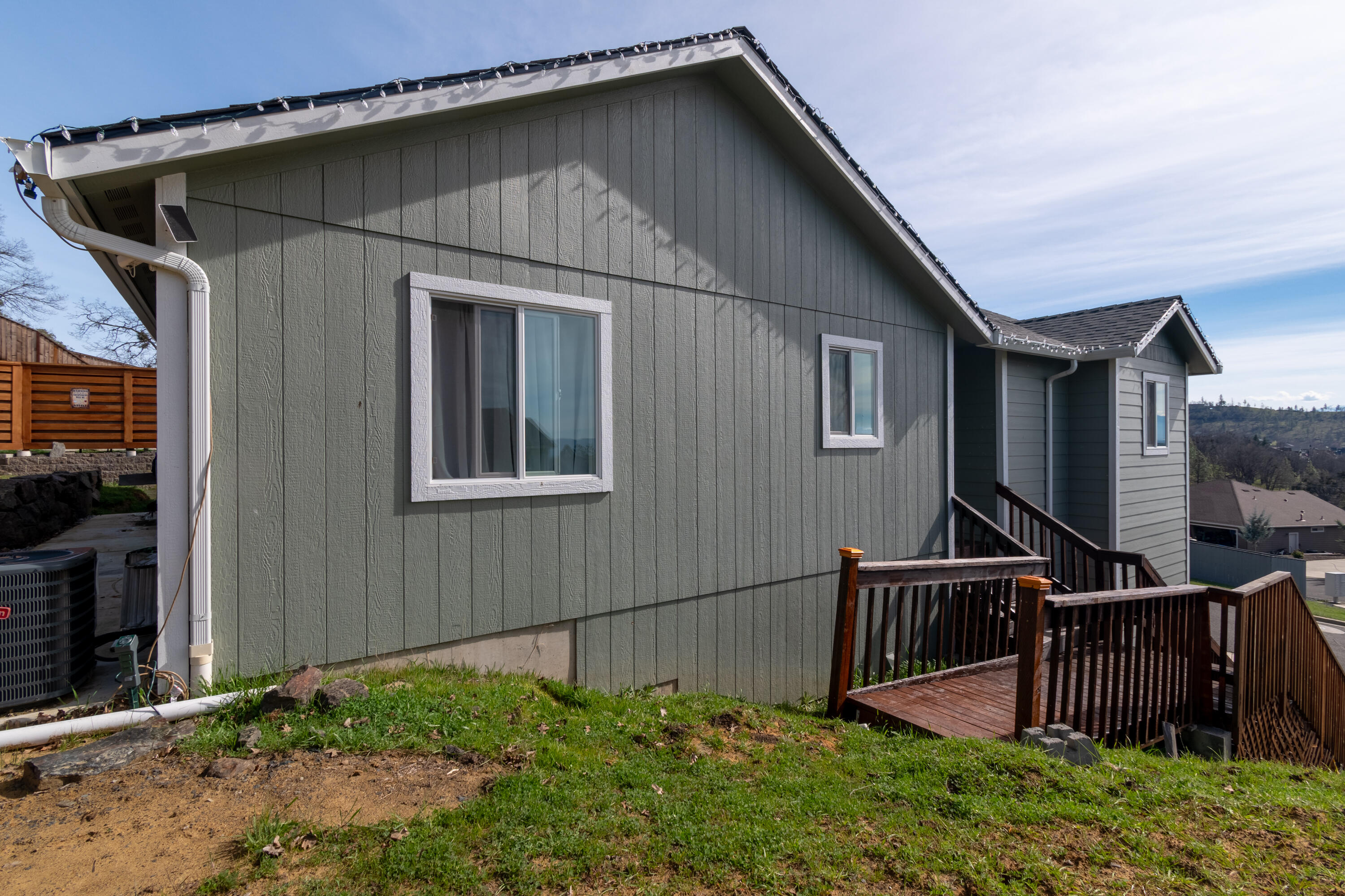 21 Cerulean Terrace Eagle Point, OR 97524 - Photo 25 of 30 a view of backyard with barbeque grill wooden floor and fence