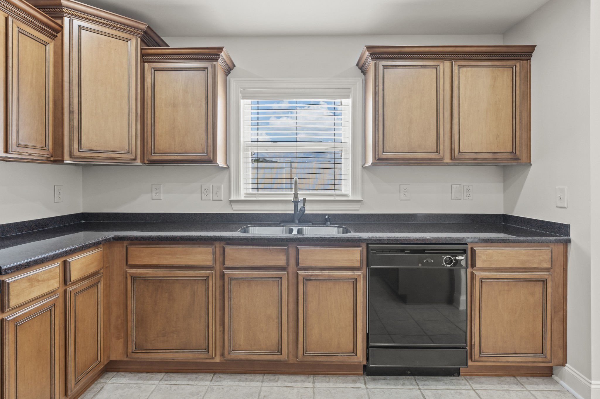 17 ANDERTON Drive Winchester, TN 37398 - Photo 16 of 42 a kitchen with granite countertop white cabinets and sink
