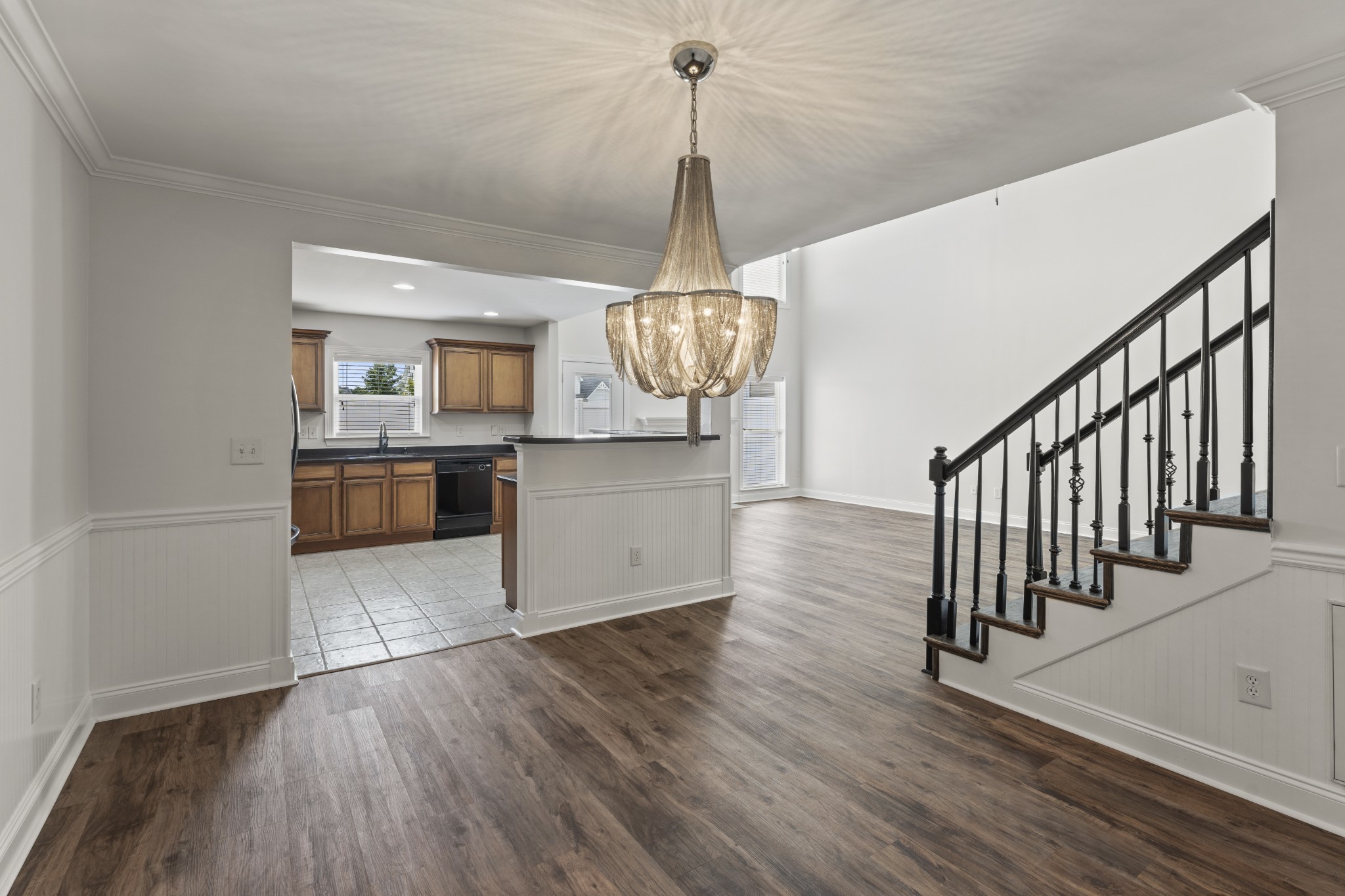 17 ANDERTON Drive Winchester, TN 37398 - Photo 20 of 42 a view of a kitchen with wooden floor and a chandelier