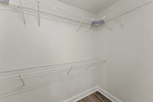 a view of empty room with ceiling fan