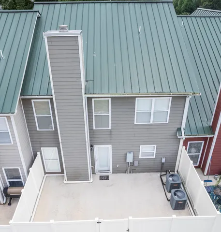 a view of a house with a street