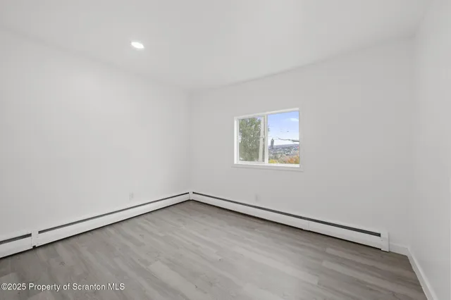 an empty room with a workbench