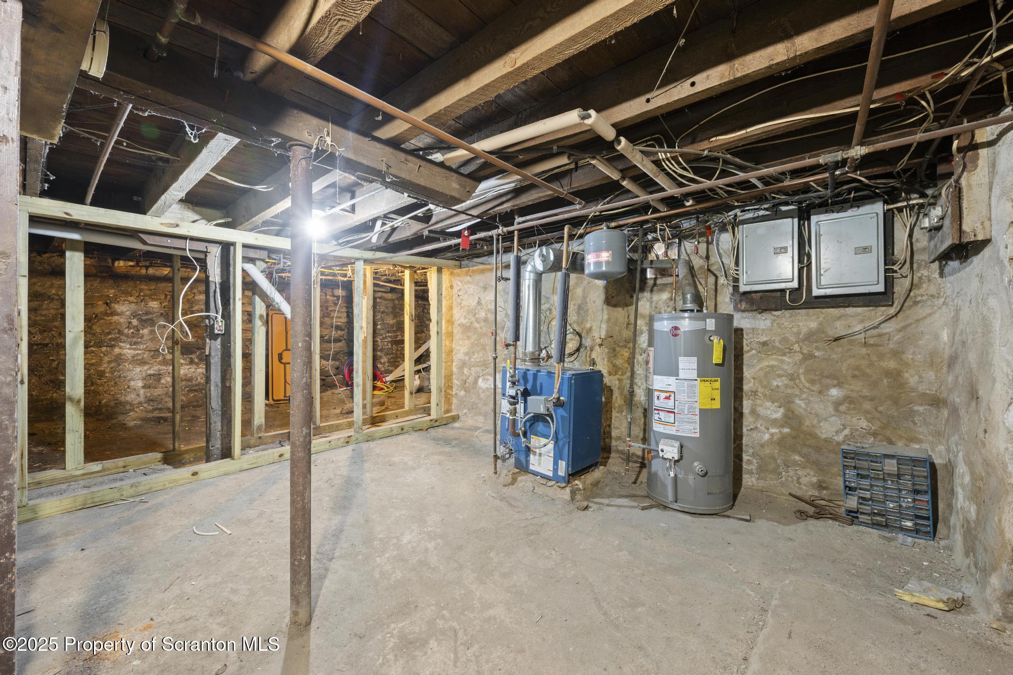 527 St Frances Cabrini Avenue, Unit 2 Scranton, PA 18504 - Photo 26 of 36 a view of an empty room with wooden walls
