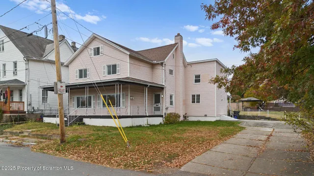 a view of a porch with a yard