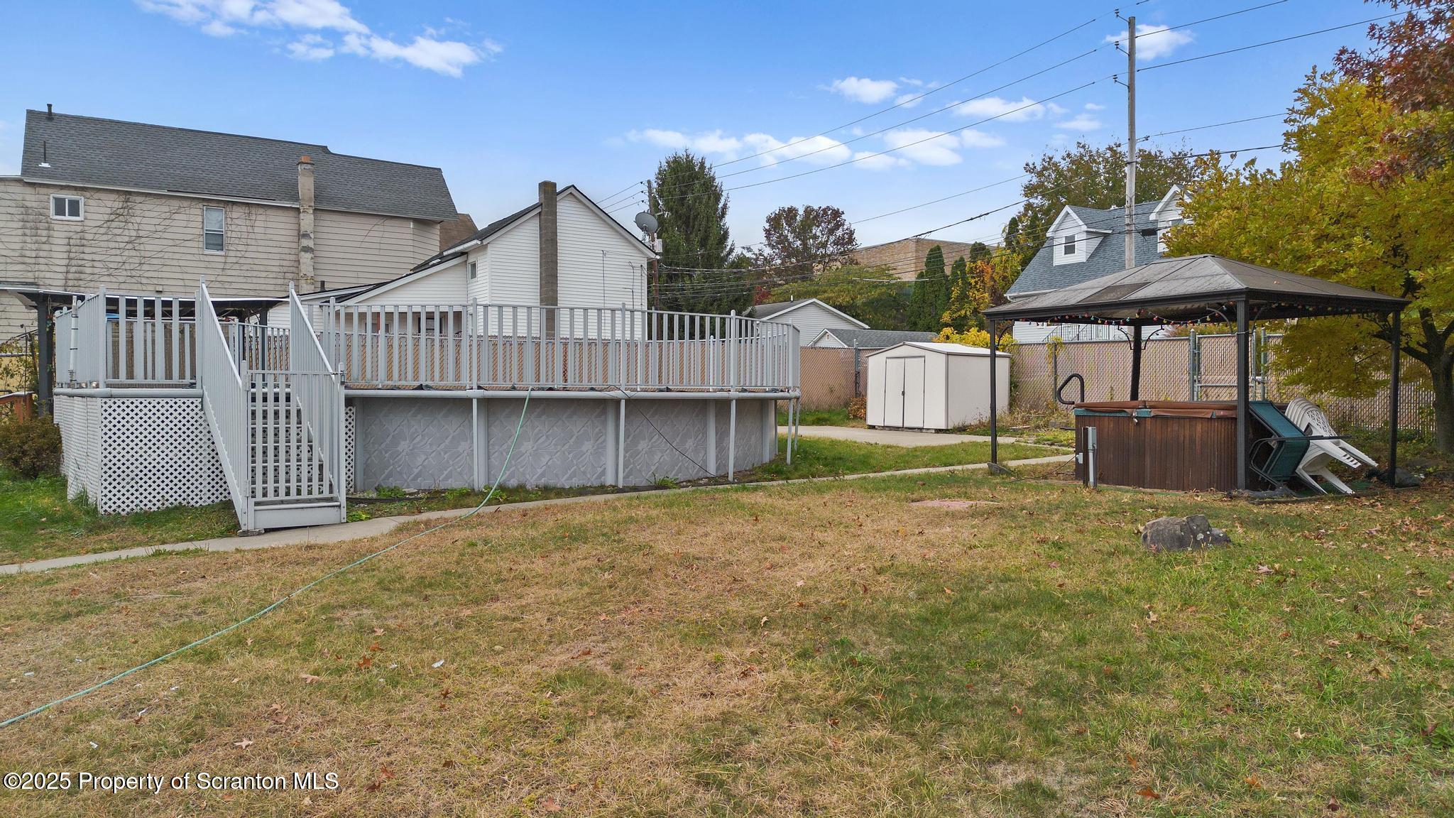 527 St Frances Cabrini Avenue, Unit 2 Scranton, PA 18504 - Photo 31 of 36 a house with wooden fence