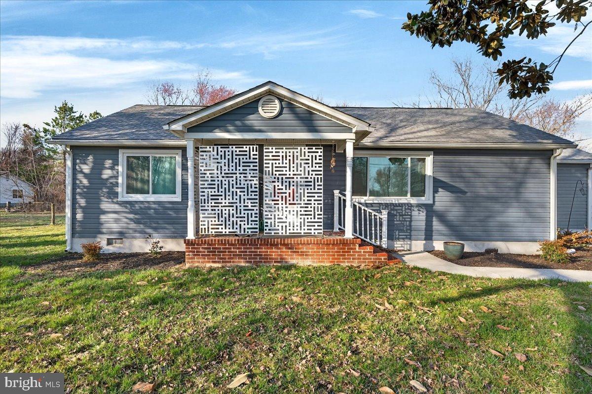 Charming home with unique front design.