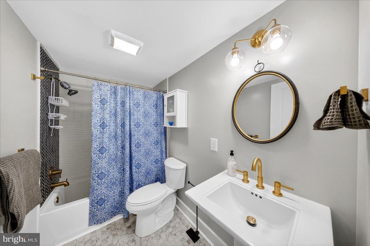 2505 West Denneys Road Dover, DE 19904 - Photo 28 of 68 Chic bathroom with modern fixtures and decor.