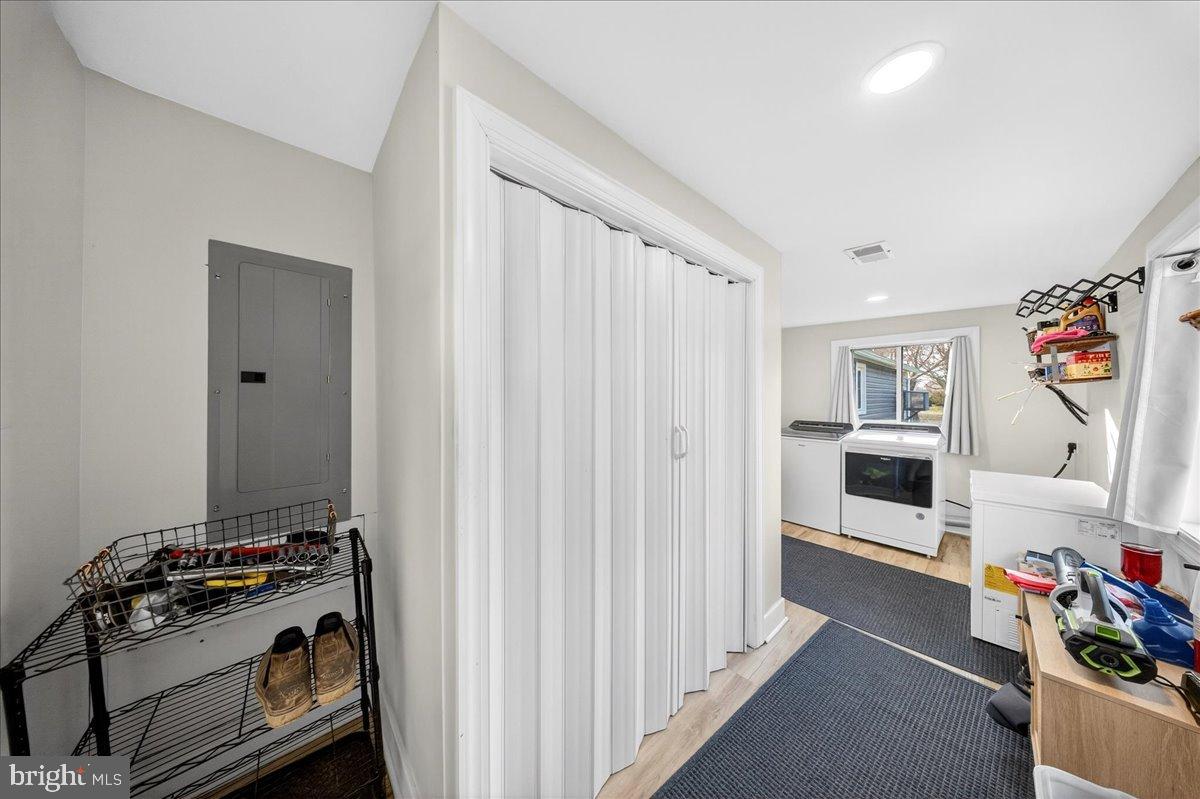 2505 West Denneys Road Dover, DE 19904 - Photo 39 of 68 Bright and functional 'mudroom' & laundry space.