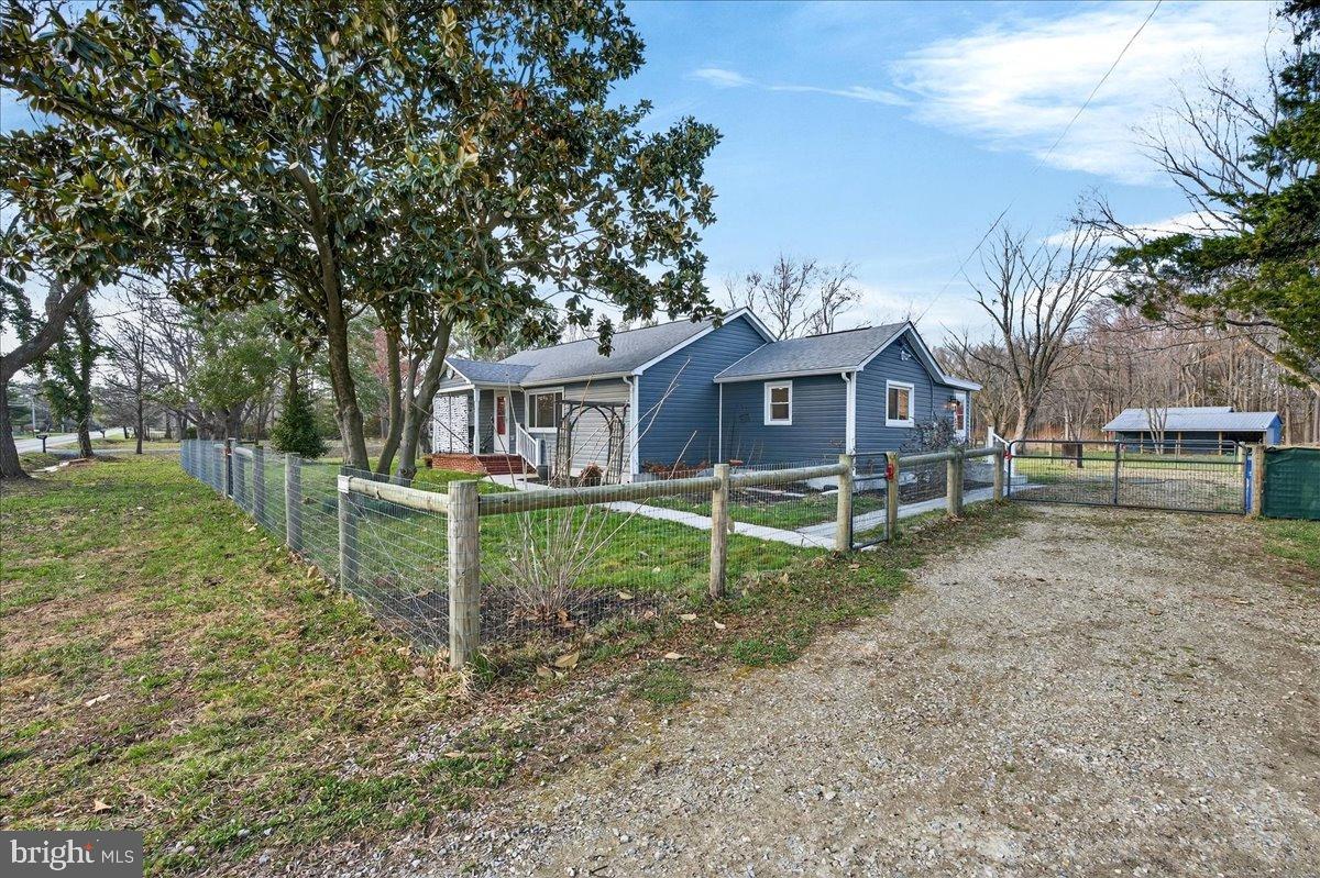 2505 West Denneys Road Dover, DE 19904 - Photo 4 of 68 Charming blue home on spacious grounds.