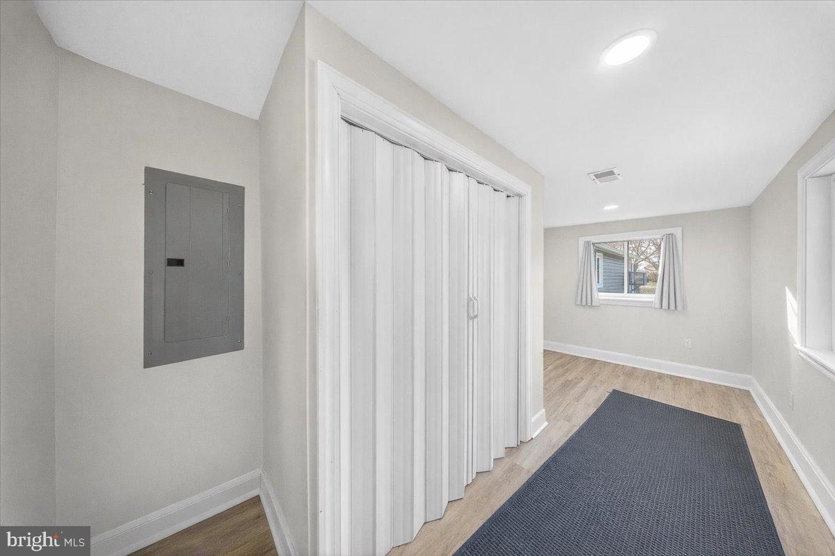 2505 West Denneys Road Dover, DE 19904 - Photo 41 of 68 Empty 'mudroom' entryway with natural light.