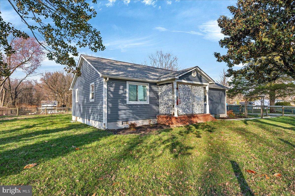 2505 West Denneys Road Dover, DE 19904 - Photo 43 of 68 Charming blue home on a spacious lawn.