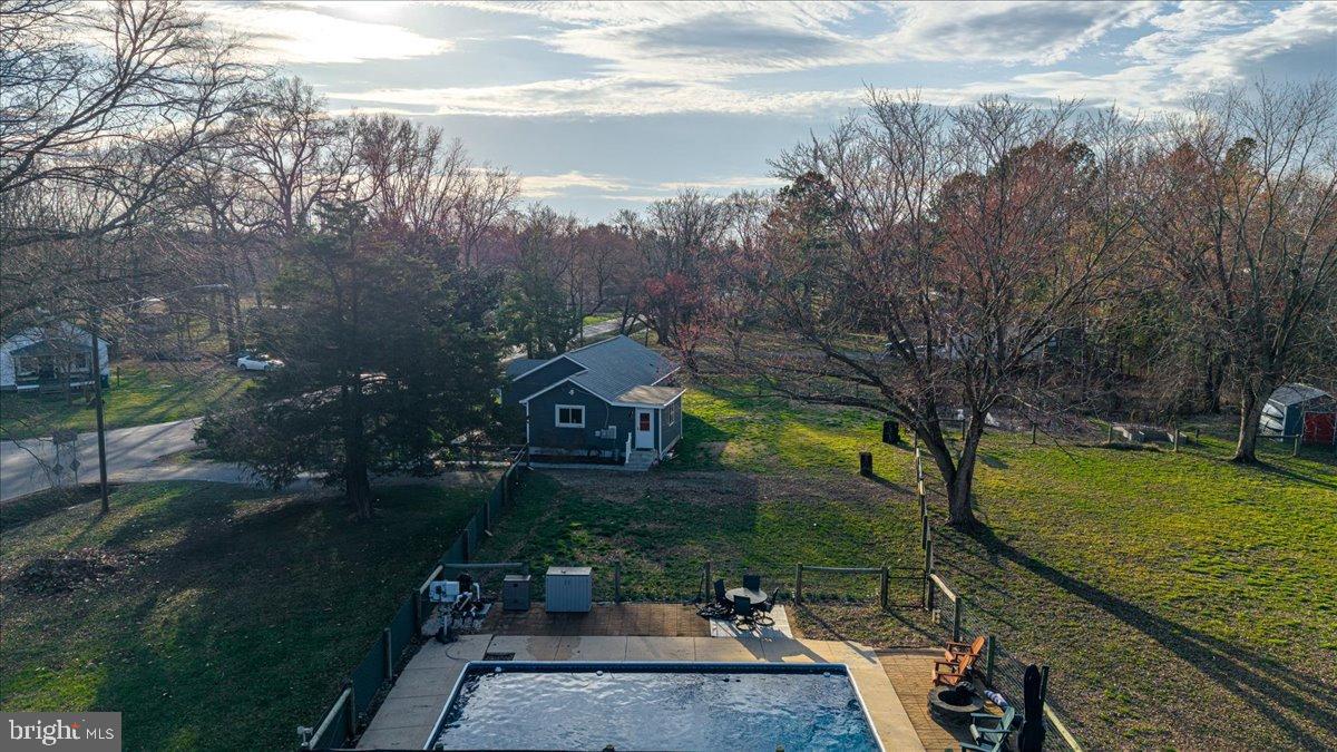 2505 West Denneys Road Dover, DE 19904 - Photo 5 of 68 Serene retreat with pool and lush surroundings.