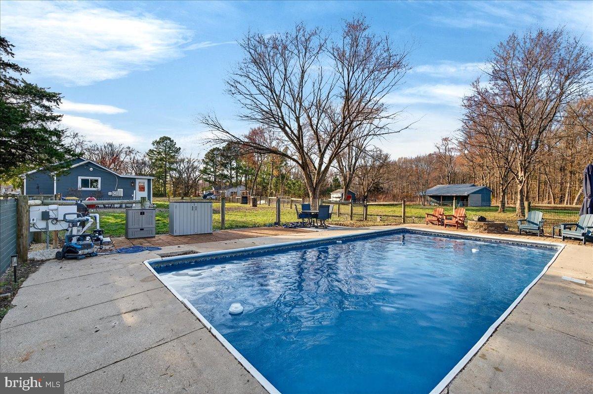 2505 West Denneys Road Dover, DE 19904 - Photo 55 of 68 Tranquil backyard oasis with inviting pool.