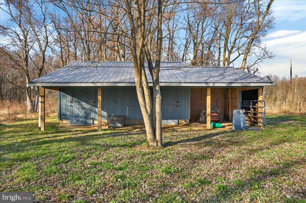 2505 West Denneys Road Dover, DE 19904 - Photo 61 of 68 Charming rustic shed nestled in nature.