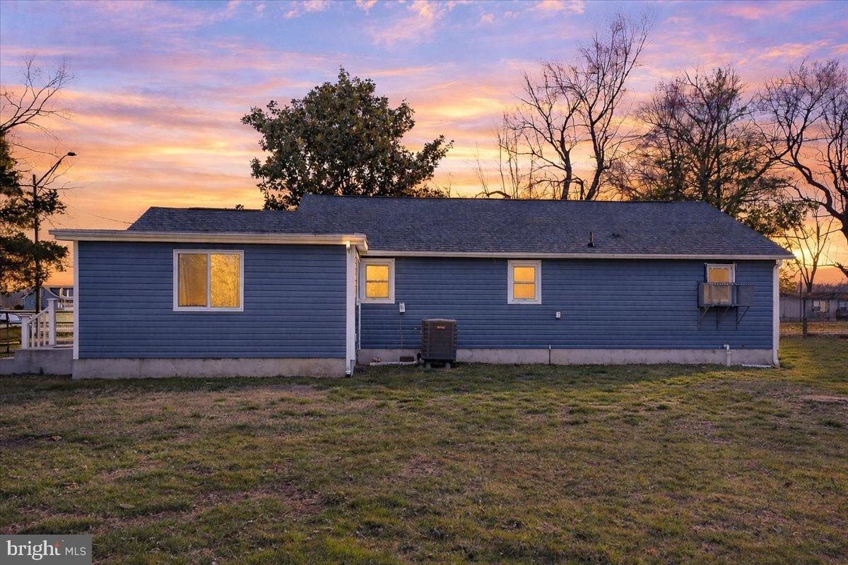 2505 West Denneys Road Dover, DE 19904 - Photo 67 of 68 Charming blue home at sunset glow.