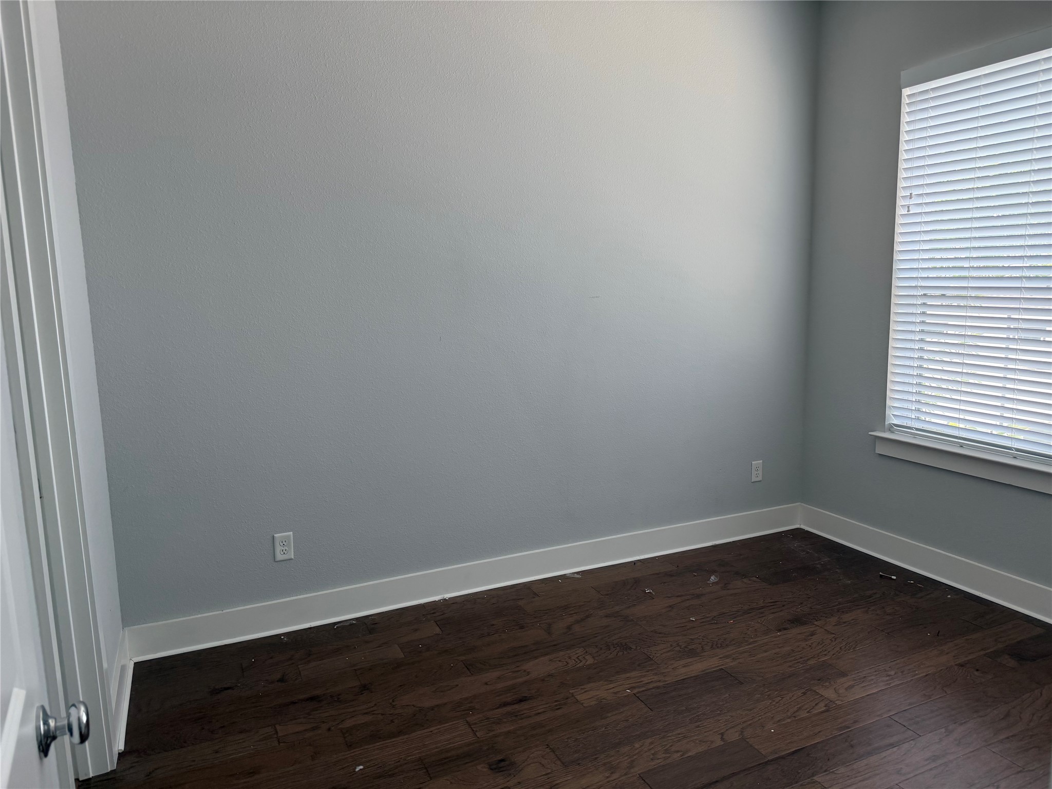 902 Martin Street, Unit A Houston, TX 77018 - Photo 16 of 21 a view of a small space with wooden floor and windows