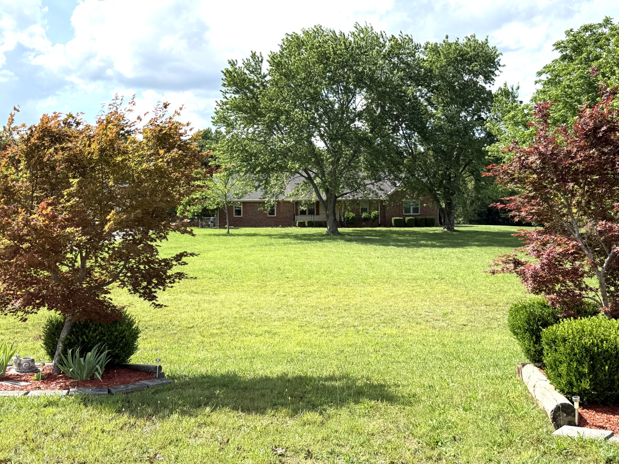 3168 Maxey Road Cedar Hill, TN 37032 - Photo 4 of 40 a view of a lake with a yard