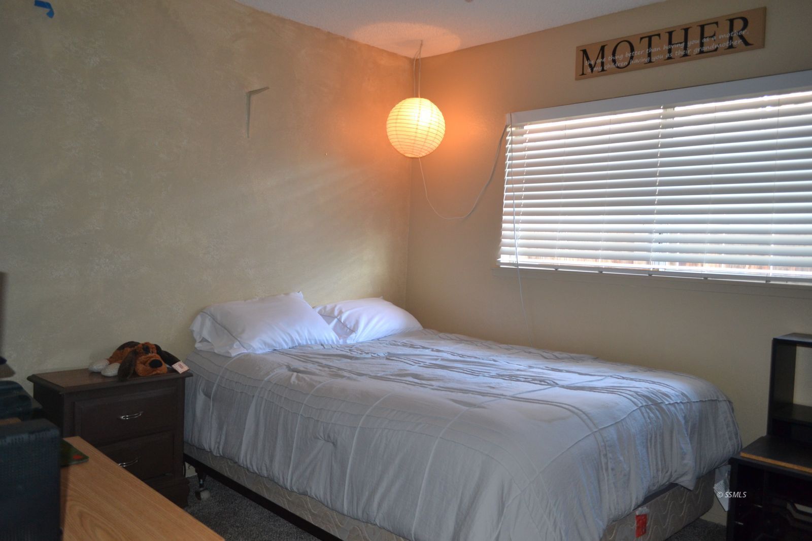429 South Fountain Street Ridgecrest, CA 93555 - Photo 25 of 33 a bedroom with a bed and a window