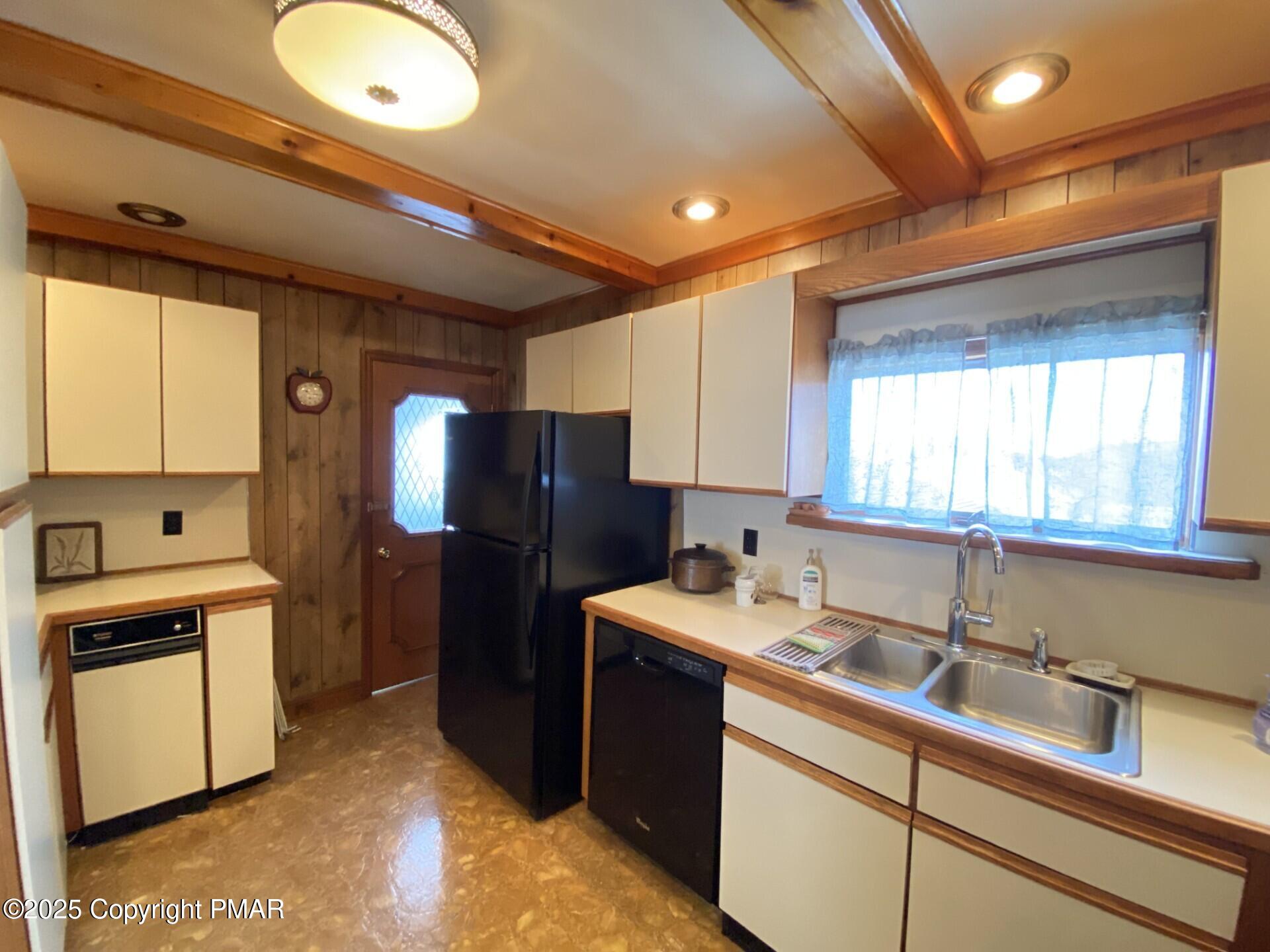 1 West Ridge Street Coaldale, PA 18218 - Photo 33 of 78 a kitchen that has a sink cabinets counter space and appliances
