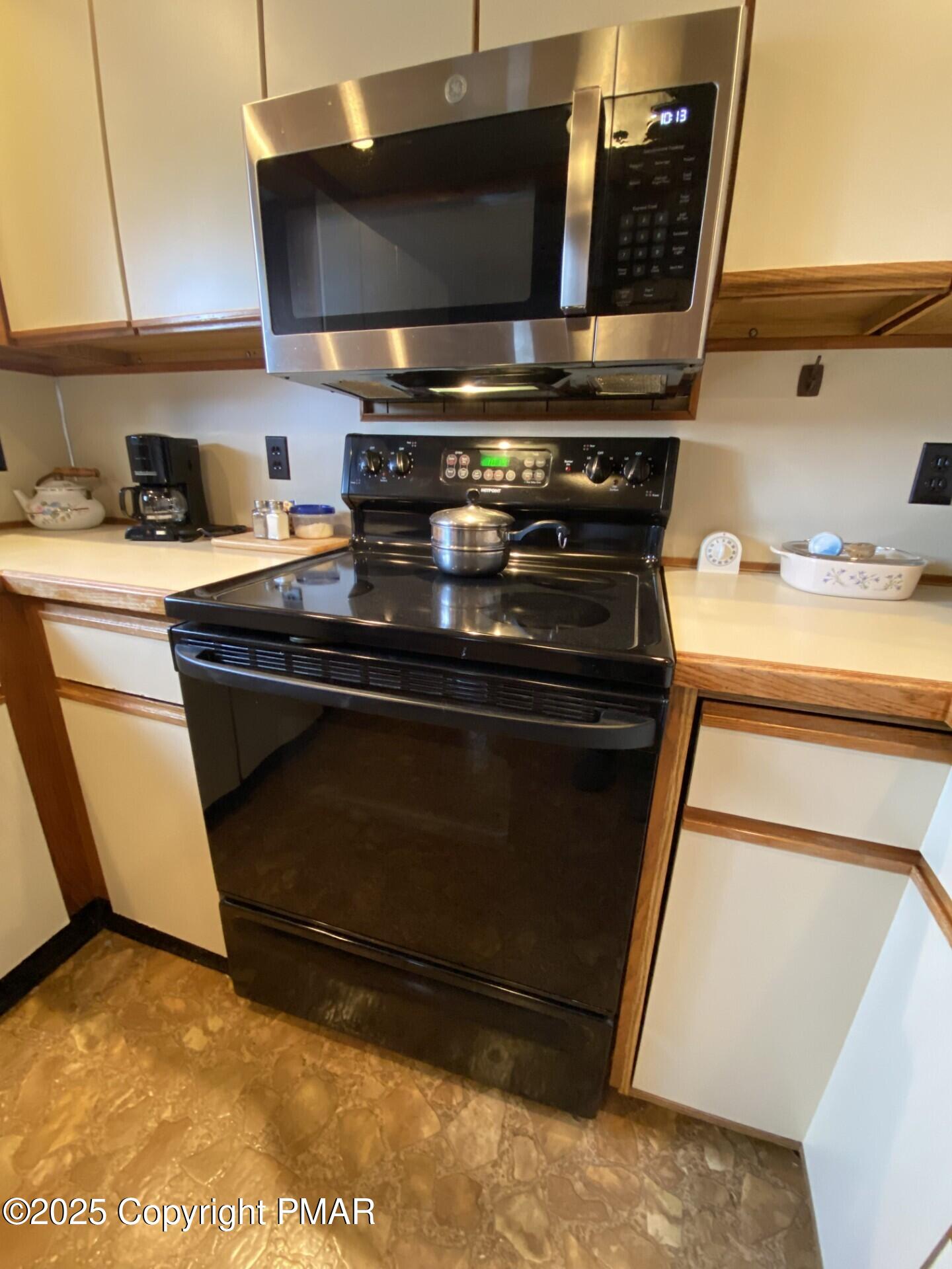 1 West Ridge Street Coaldale, PA 18218 - Photo 34 of 78 a stove top oven sitting inside of a kitchen