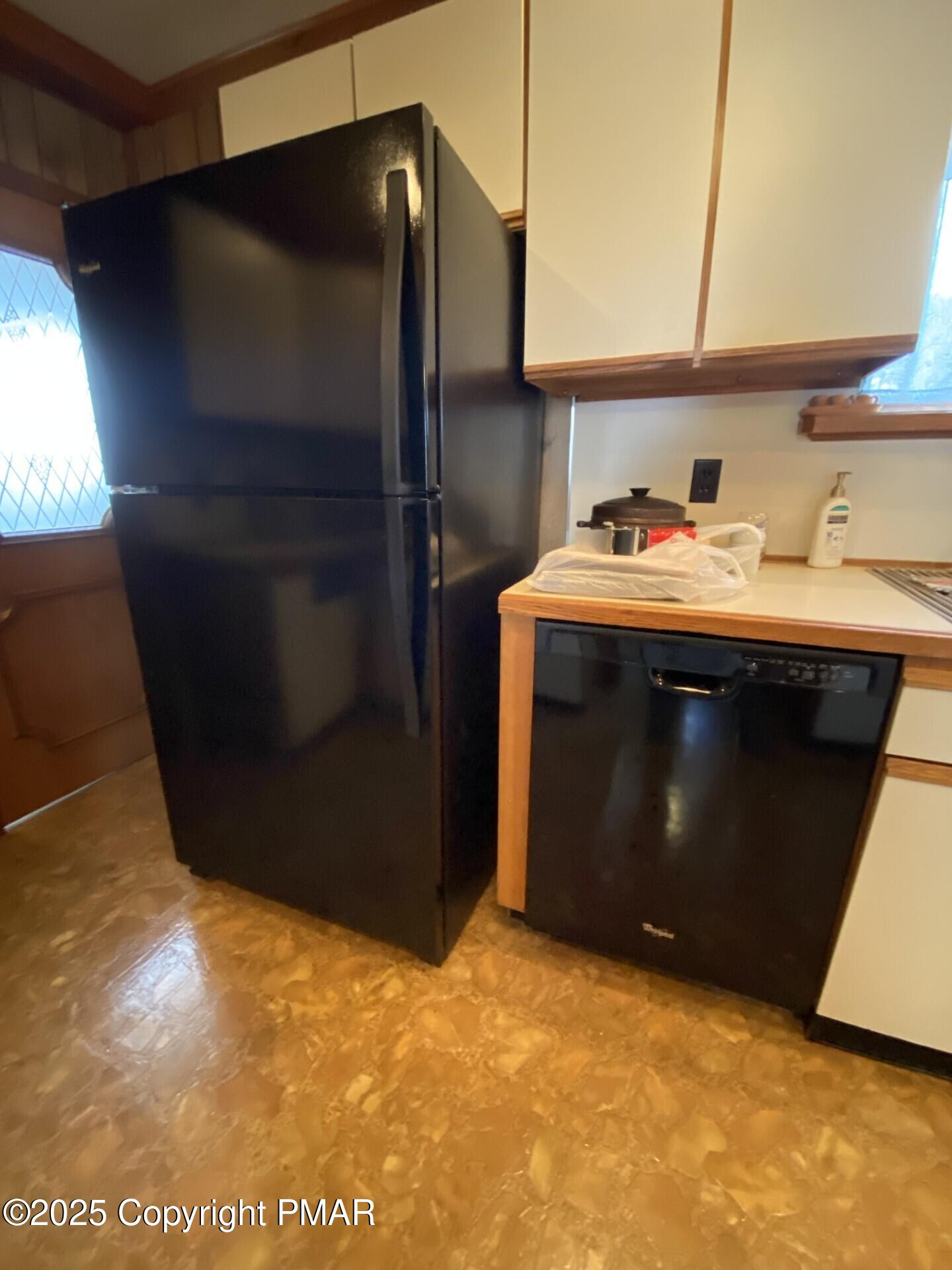 1 West Ridge Street Coaldale, PA 18218 - Photo 35 of 78 a kitchen with stainless steel appliances granite countertop a refrigerator and a stove