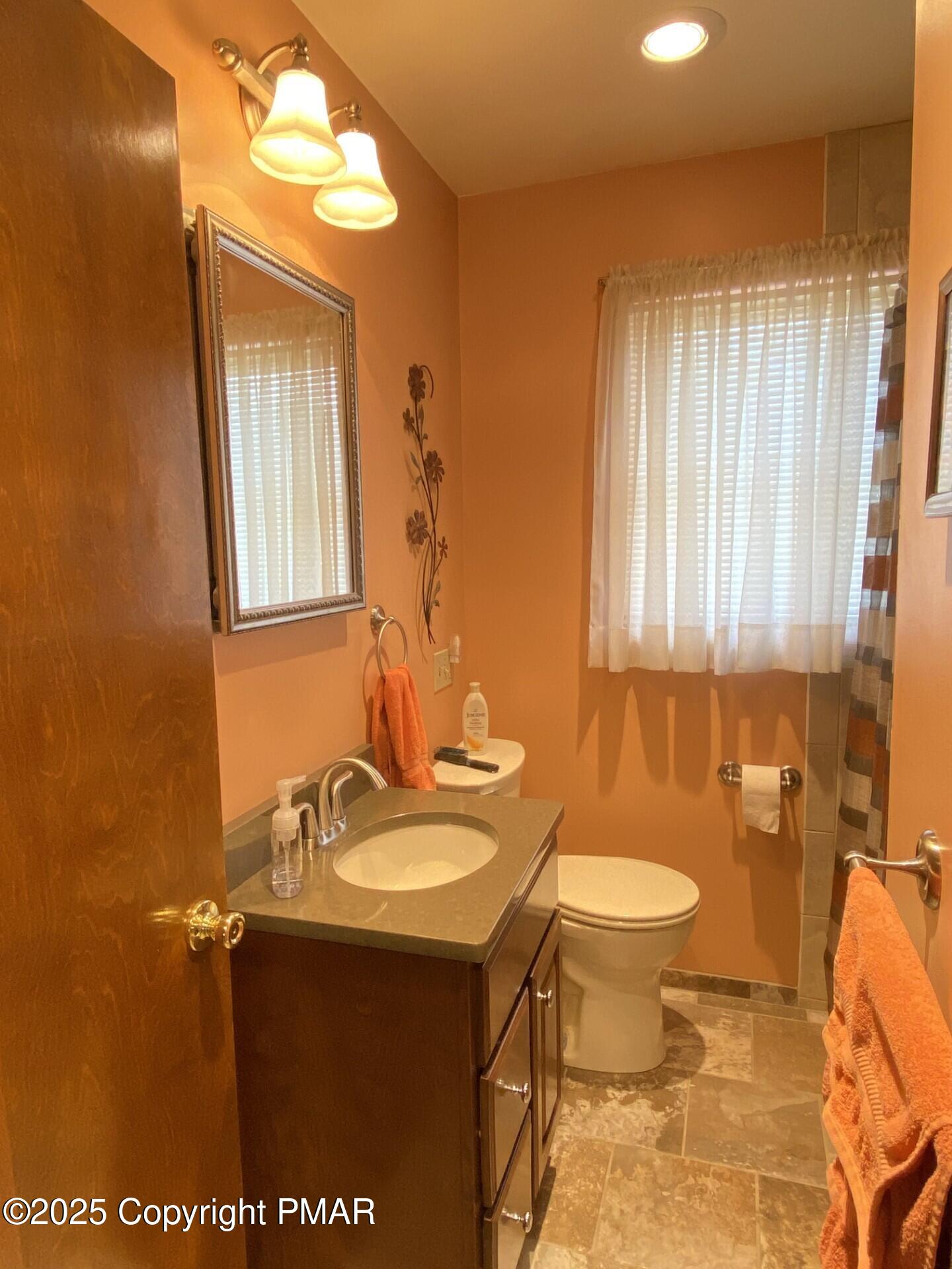 1 West Ridge Street Coaldale, PA 18218 - Photo 58 of 78 a bathroom with a sink toilet and mirror