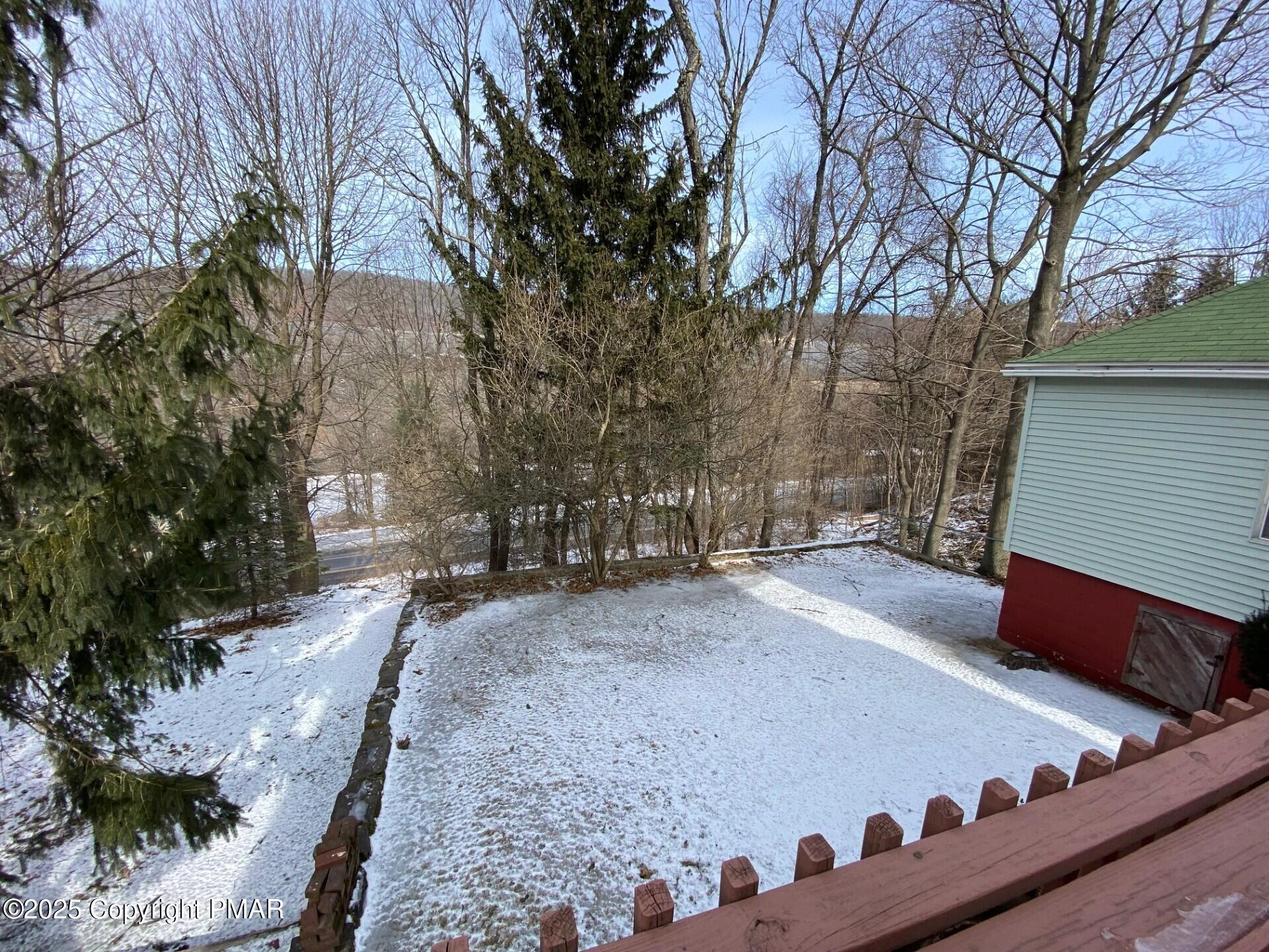 1 West Ridge Street Coaldale, PA 18218 - Photo 6 of 78 a view of a backyard with trees