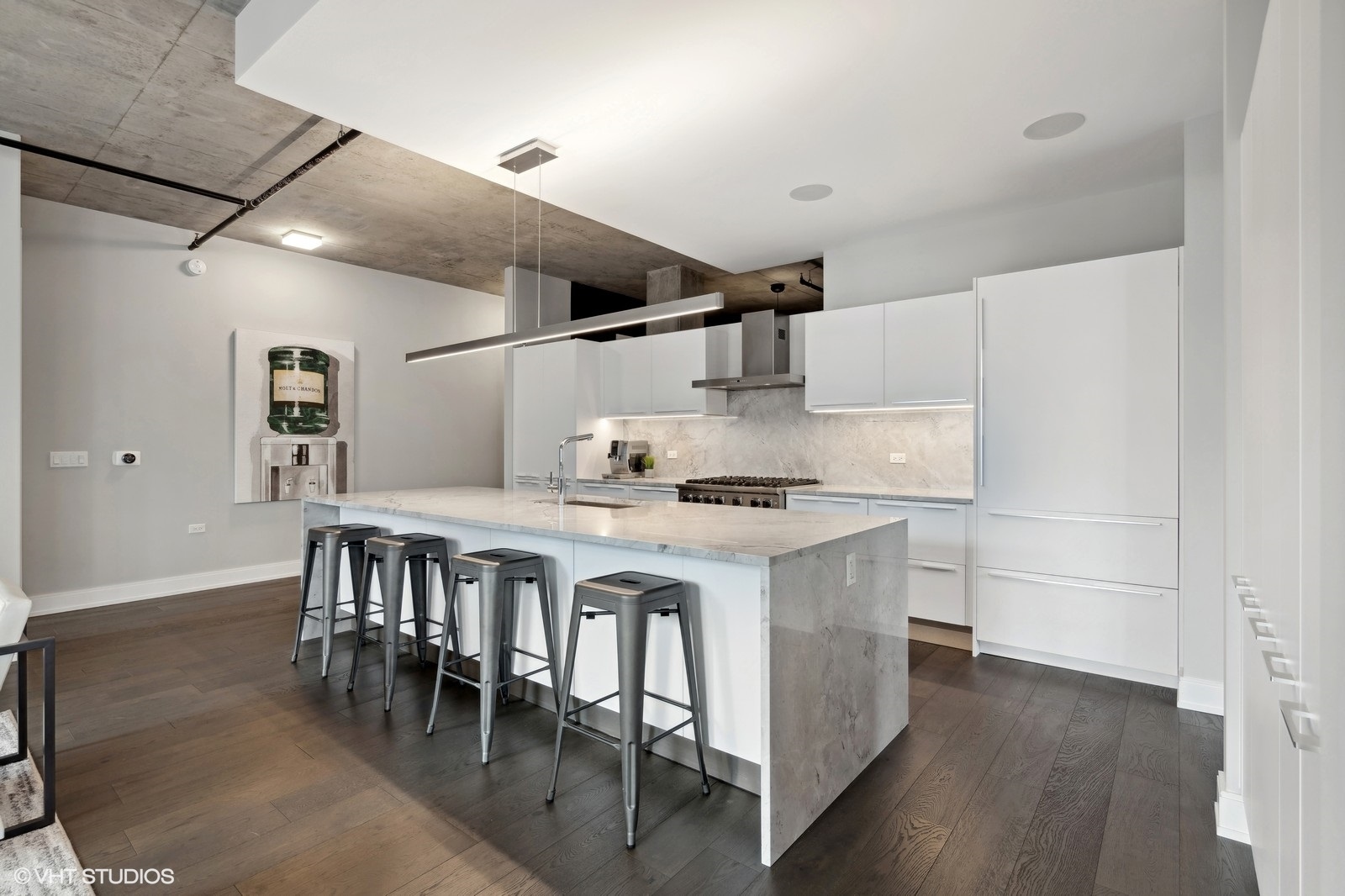 111 South Peoria Street, Unit 404 Chicago, IL 60607 - Photo 12 of 37 a kitchen with a table chairs and a stove
