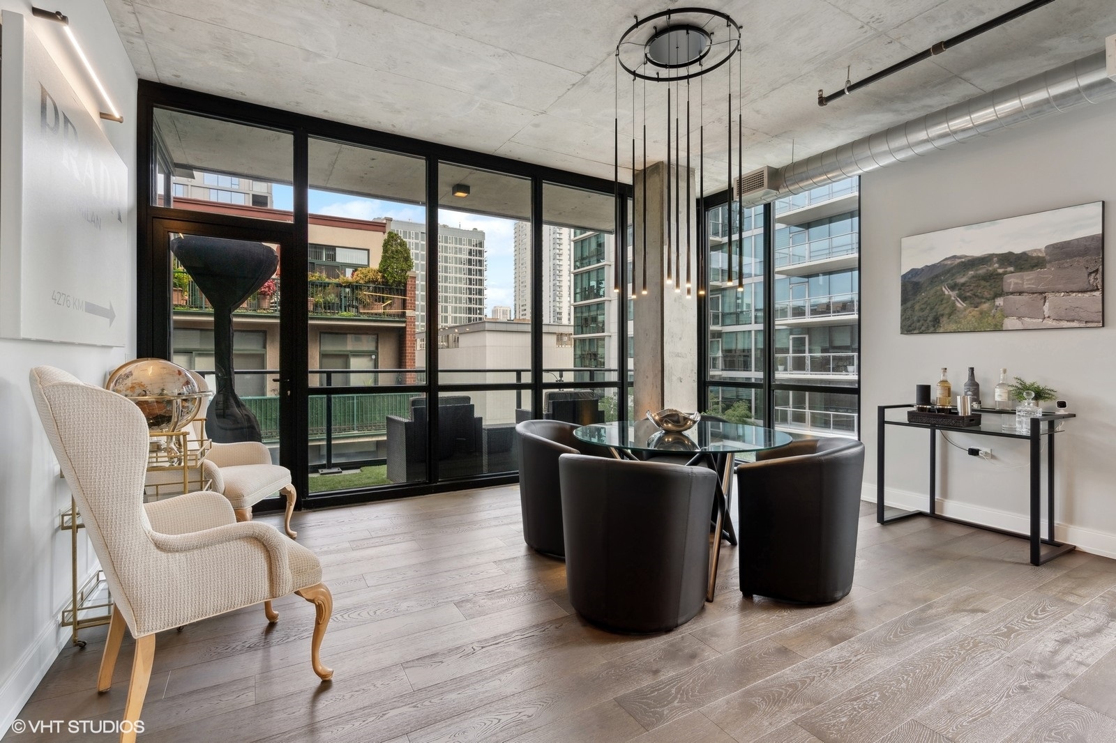 111 South Peoria Street, Unit 404 Chicago, IL 60607 - Photo 15 of 37 a living room with furniture a large window and wooden floor