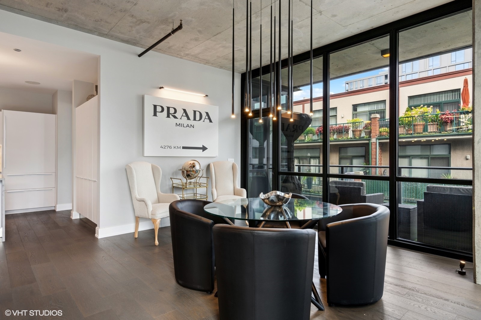 111 South Peoria Street, Unit 404 Chicago, IL 60607 - Photo 16 of 37 a living room with furniture floor to ceiling window and wooden floor