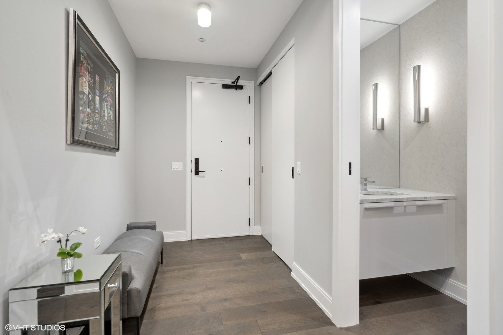111 South Peoria Street, Unit 404 Chicago, IL 60607 - Photo 35 of 37 a view of a livingroom with furniture and a hallway